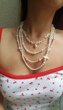 Cross of PAWA: High Lustre Cross Shape Baroque and Round White Pearl Necklace