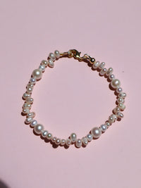 Enchante : High Lustre Round and Rice Shape Bracelet (AAAA Grade)