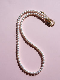 Ideale High Lustre Nearly Round and Rice Shape Pearl Strand Necklace (AAA Grade)