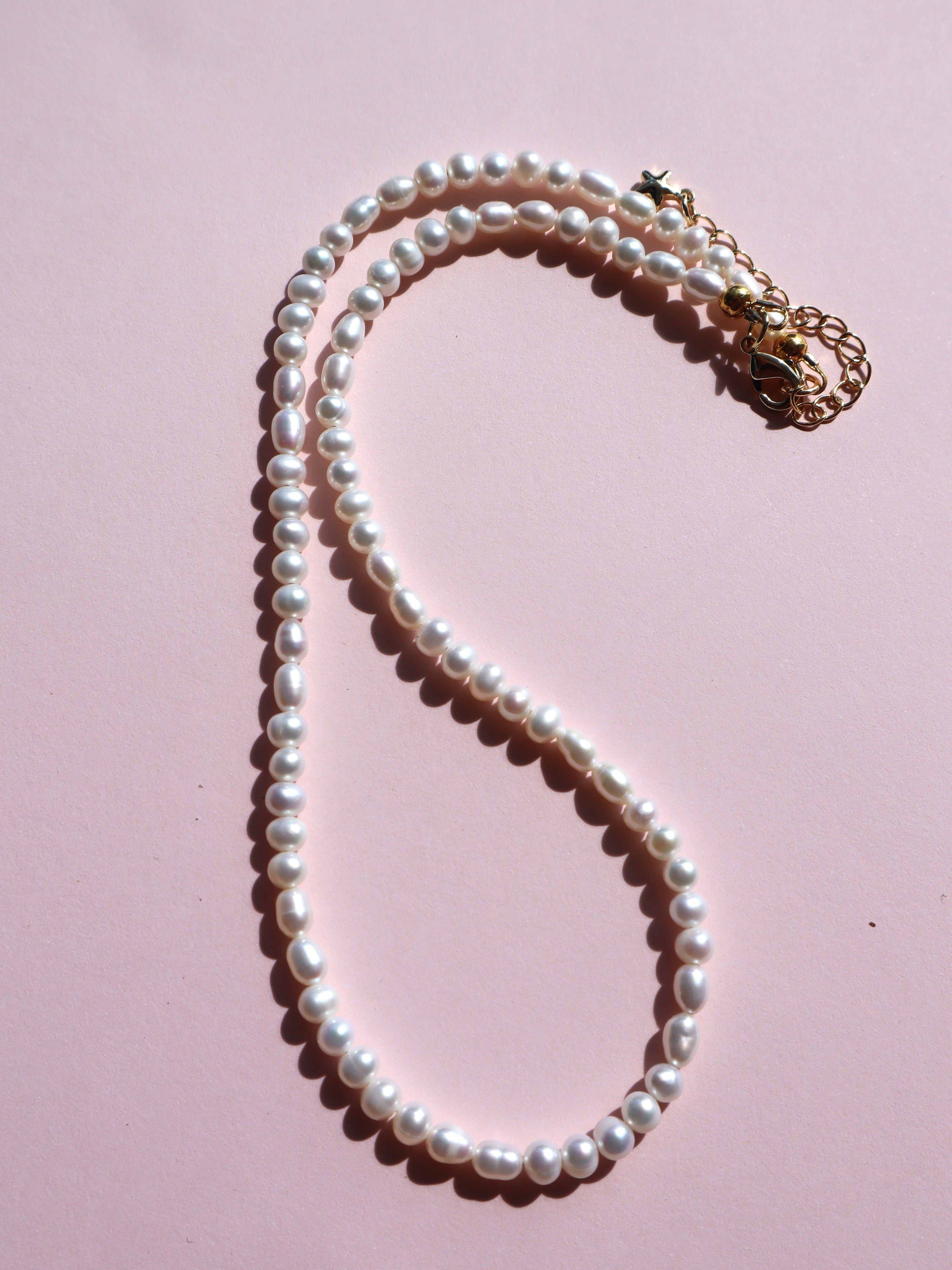 Ideale High Lustre Nearly Round and Rice Shape Pearl Strand Necklace (AAA Grade)
