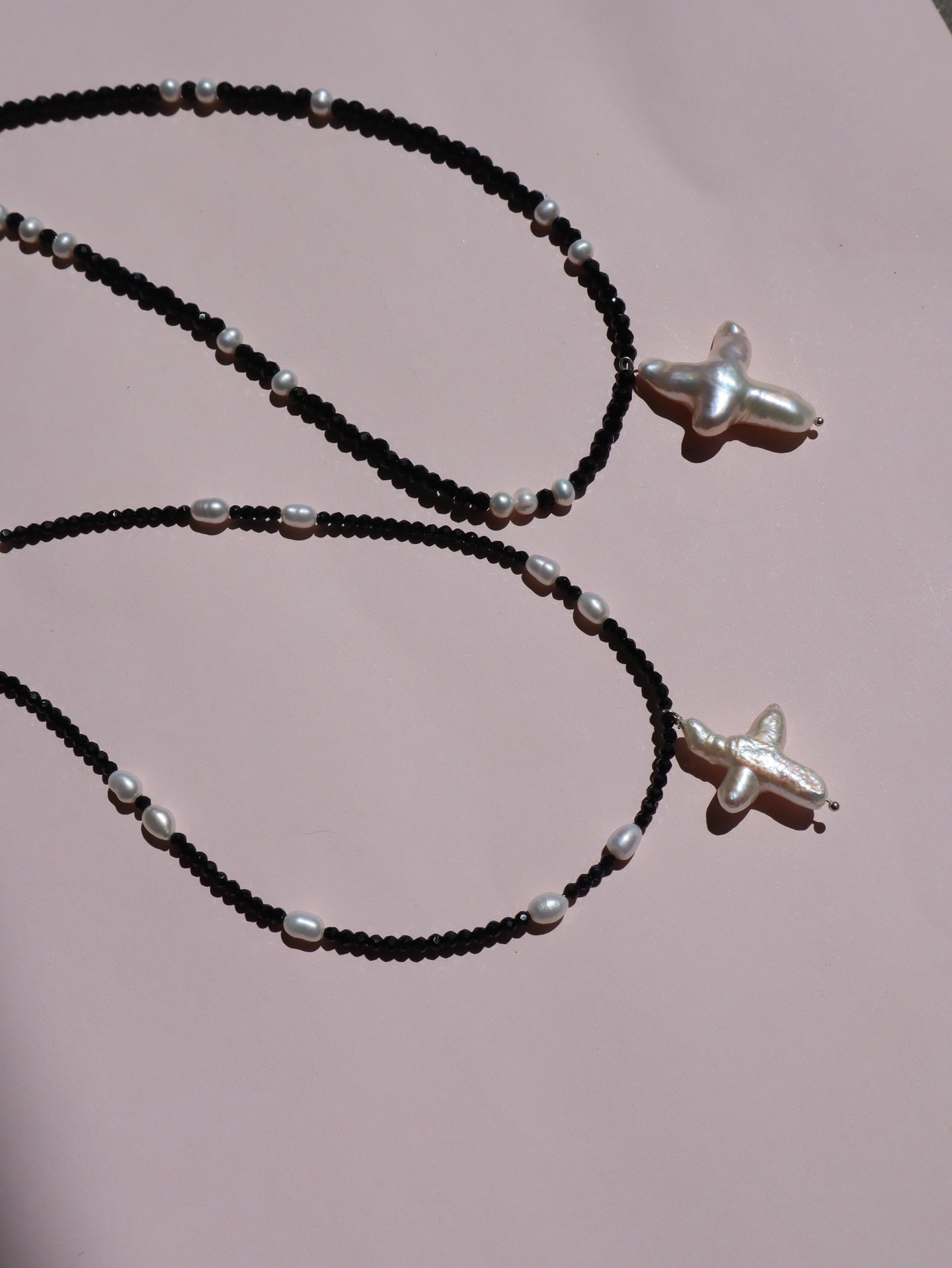 Cross of PAWA: High Lustre Cross Shape Baroque White Pearl Black Spinel Necklace