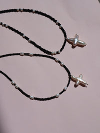 Cross of PAWA: High Lustre Cross Shape Baroque White Pearl Black Spinel Necklace
